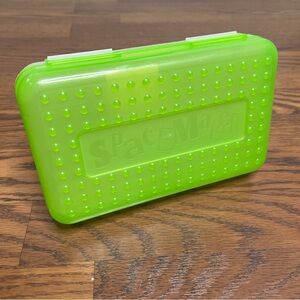 vintage 1990s Spacemaker pencil box in a neon green color